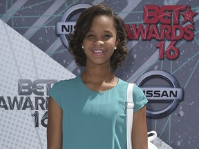 FILE - In this June 26, 2016 file photo, Quvenzhané Wallis arrives at the BET Awards in Los Angeles. Wallis is releasing two children's books: "Shai & Emmie Star in Break an Egg! ," which chronicles the lives of two best friends at a performing arts school, and "A Night Out with Mama," a picture book inspired by her experience at the Oscars. (Photo by Jordan Strauss/Invision/AP, File)