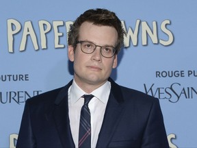 FILE - In this July 21, 2015, file photo, author John Green attends the premiere of "Paper Towns" in New York. Green's new novel, "Turtles All The Way Down" centers around a 16-year-old girl with obsessive compulsive disorder, like Green himself, but she's thrust into the role of a teen detective trying to locate a missing billionaire while falling for his son. (Photo by Evan Agostini/Invision/AP, File)