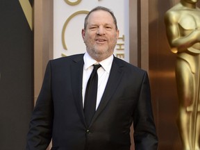 FILE - In this March 2, 2014 file photo, Harvey Weinstein arrives at the Oscars at the Dolby Theatre in Los Angeles. The Producers Guild of America has voted unanimously to institute termination proceedings for Harvey Weinstein. The PGA's National Board of Directors and Officers said Monday, Oct. 16, 2017, that Weinstein has an opportunity to respond before a final decision is made on Nov. 6. (Photo by Jordan Strauss/Invision/AP, File)