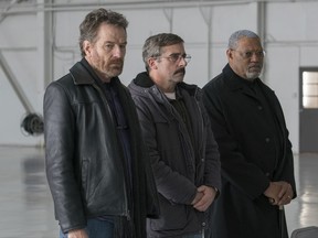 This image released by Lionsgate shows Bryan Cranston, from left, Steve Carell and Laurence Fishburne in a scene from "Last Flag Flying." (Wilson Webb/Lionsgate via AP)