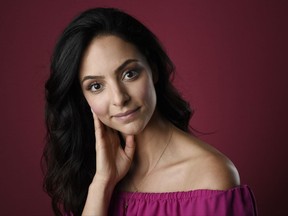 FILE - In this Aug. 2, 2017 file photo, Tala Ashe, a cast member in the CW series "DC's Legends of Tomorrow," poses for a portrait during the 2017 Television Critics Association Summer Press Tour in Beverly Hills, Calif.  Ashe is thrilled to debut her new character, a Muslim-American superhero joining season three of "DC's Legends of Tomorrow," airing Tuesday. (Photo by Chris Pizzello/Invision/AP, File)