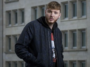 In this Sept. 18, 2017 photo, British singer James Arthur poses for a portrait in New York to promote his latest album, "Back From the Edge." (Photo by Drew Gurian/Invision/AP)