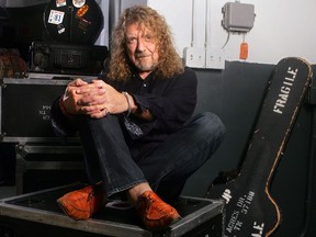 FILE - In this July 30, 2010 file photo, singer Robert Plant poses for a portrait in Miami. The former Led Zeppelin singer has a new album, "Carry Fire," out Friday,  (AP Photo/Carlo Allegri, File)