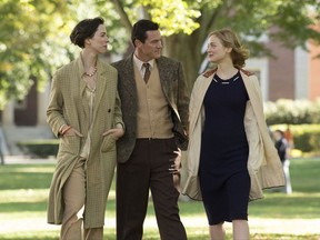 This image released by Annapurna Pictures shows Rebecca Hall as Elizabeth Marston, from left, Luke Evans as Dr. William Marston and Bella Heathcote as Olive Byrne in "Professor Marston and the Wonder Women." The film charts the unorthodox creation of Wonder Woman, which drew on Marston's research into sexuality and gender, as well as his own family: a threesome that harmoniously raised four children together. (Claire Folger/Annapurna Pictures via AP)