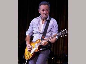 FILE - In this April 21, 2017 file photo, Bruce Springsteen performs at The Asbury Park Music And Film Festival in Asbury Park, N.J. Springsteen makes his Broadway debut Thursday, Oct. 12, in a solo show in which he performs songs from his career, interspersed with readings of his best-selling memoir "Born to Run."  (Photo by Michael Zorn/Invision/AP, File)