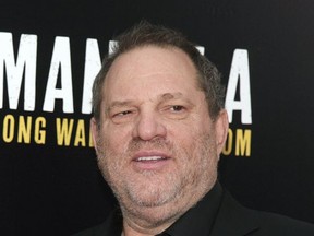 FILE - In this Nov. 25, 2013 file photo, producer Harvey Weinstein attends a screening of "Mandela: Long Walk To Freedom" in New York.  Los Angeles police said Thursday Oct. 19, 2017, that it is investigating a possible sexual assault case involving Harvey Weinstein that involves alleged conduct from 2013. The department released few details about the inquiry other than to say it has interviewed a potential victim and its inquiry is ongoing. (Photo by Andy Kropa/Invision/AP, File)