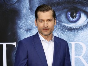 FILE - In this July 12, 2017 file photo, Nikolaj Coster-Waldau arrives at the "Game of Thrones" premiere in Los Angeles. At an appearance on the Scandinavian chat show "Skavlan," Coster-Waldau revealed the unprecedented measures now being implemented to plug any leaks of top-secret story details during filming of the series' final season. (Photo by Willy Sanjuan/Invision/AP, File)