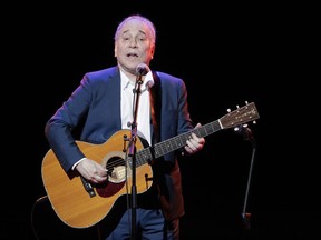 FILE - In this Sept. 22, 2016 file photo, musician Paul Simon performs during the Global Citizen Festival in New York. Simon was at Skidmore College in Saratoga Springs on Thursday, Oct. 26, 2017 to participate in a master class about songwriting, followed by an event titled "Paul Simon: A Conversation about a Musical Life." (AP Photo/Julie Jacobson, File)