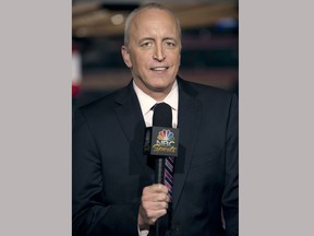 This April 4, 2011 image released by NBC Universal shows announcer Dave Strader for "NHL on Versus," in New York. Strader died Sunday, Oct. 1, 2017, at his home in Glens Falls, N.Y., after battling bile duct cancer for over a year. He was 62. (Virginia Sherwood/NBC Universal via AP)