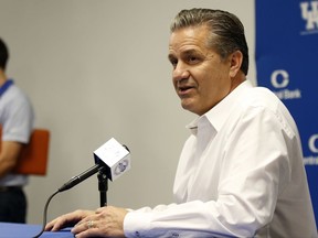 In this Oct. 12, 2017, photo, Kentucky head coach John Calipari speaks to the media during the school's NCAA college basketball media day in Lexington, Ky. Southeastern Conference teams should have plenty to boast about at their annual event to meet with media and discuss the upcoming season. Defending league champion Kentucky should garner much of the preseason attention at this year's Tipoff event. (AP Photo/James Crisp)