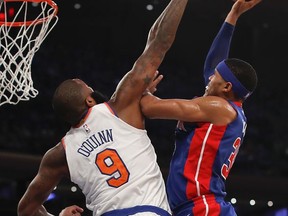 Detroit Pistons forward Tobias Harris (34) puts up a shot against New York Knicks center Kyle O'Quinn (9) during the first quarter of an NBA basketball game, Saturday, Oct. 21, 2017, in New York. (AP Photo/Julie Jacobson)