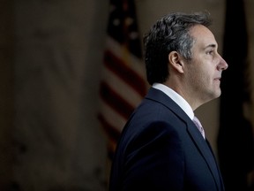 FILE- In this Sept. 19, 2017, file photo, President Donald Trump's lawyer Michael Cohen departs following a closed door meeting with the Senate Intelligence Committee on Capitol Hill in Washington. Cohen is scheduled to speak Tuesday, Oct. 24, with investigators for the House probe into Russia's involvement in the 2016 U.S. presidential election. (AP Photo/Andrew Harnik, File)