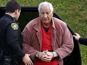 FILE - In this Oct. 29, 2015, file photo, former Penn State University assistant football coach Jerry Sandusky arrives for an appeal hearing at the Centre County Courthouse in Bellefonte, Pa. A Pennsylvania judge is set to announce whether Sandusky will get a second shot at persuading a jury he's innocent of child molestation charges. Judge John Foradora says he'll post his opinion and order in Sandusky's request for a new trial or dismissal of charges online at noon on Wednesday, Oct. 18, 2017. (AP Photo/Gene J. Puskar, File)