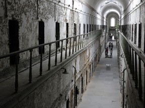 FILE - In this Sept. 27, 2013, file photo, Eastern State Penitentiary in Philadelphia is shown. The penitentiary took in its first inmate in 1829, closed in 1971 and reopened as a museum in 1994. The site is mentioned in the book "Ghostland: An American History in Haunted Places." (AP Photo/Matt Rourke, File)