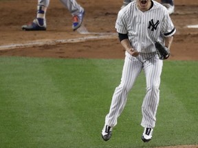 New York Yankees starting pitcher Masahiro Tanaka reacts after striking out Houston Astros' Josh Reddick during the fifth inning of Game 5 of baseball's American League Championship Series Wednesday, Oct. 18, 2017, in New York. (AP Photo/Frank Franklin II)