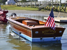 FILE- In this undated file photo provided by Guernsey's, is John F. Kennedy's speedboat, Restofus. Hot memorabilia with a Cold War theme, including property of the late President John F. Kennedy and CIA pilot Francis Gary Powers, is being featured at an auction in New York City on Saturday, Oct. 7, 2017. (Guernsey's via AP)