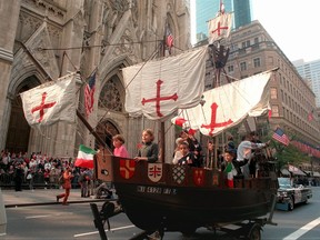 FILE- In this Oct. 14, 1996, file photo, a model of the "Santa Maria," one of Christopher Columbus' three ships, is pulled up New York's Fifth Avenue in front of St. Patrick's Cathedral during the 56th Columbus Day Parade. A movement to abolish Columbus Day and replace it with Indigenous Peoples Day has new momentum but the gesture to recognize victims of European colonialism has also prompted howls of outrage from some Italian Americans, who say eliminating their festival of ethnic pride is culturally insensitive, too. (AP Photo/Marty Lederhandler, File)