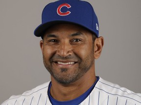 FILE - This Tuesday, Feb. 21, 2017, file photo shows Chicago Cubs bench coach Dave Martinez. A person with knowledge of the deal tells The Associated Press, Sunday, Oct. 29, 2017, that the Washington Nationals and Martinez have agreed to a managerial contract for three years plus an option. (AP Photo/Morry Gash, File)