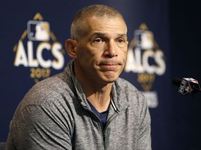 New York Yankees manager Joe Girardi answers questions during an American League Championship Series news conference on Sunday, Oct. 15, 2017 in New York.