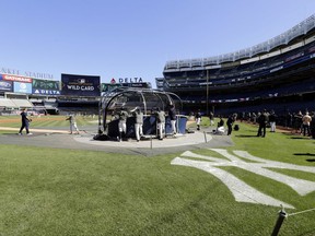 The New York Yankees take batting practice during a workout at Yankees Stadium, Monday, Oct. 2, 2017, in New York. The Yankees host the Minnesota Twins in the American League wild card playoff game on Tuesday. (AP Photo/Frank Franklin II)