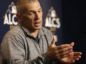 New York Yankees manager Joe Girardi answers questions during a news conference before an American League Championship Series baseball workout day in New York, Sunday, Oct. 15, 2017. The Yankees face the Houston Astros in Game 3 of the ALCS Monday night in New York. (AP Photo/Kathy Willens)
