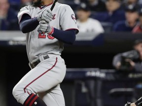 Minnesota Twins' Byron Buxton watches his ground ball on which a runner was forced and a run scored during the third inning of the American League wild-card baseball game against the New York Yankees, Tuesday, Oct. 3, 2017, in New York. (AP Photo/Frank Franklin II)