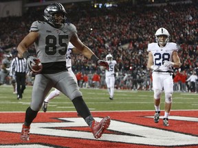 Ohio State tight end Marcus Baugh scores a touchdown against Penn State during the second half of an NCAA college football game Saturday, Oct. 28, 2017, in Columbus, Ohio. Ohio State beat Penn State 39-38. (AP Photo/Jay LaPrete)