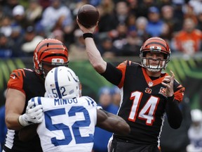 Cincinnati Bengals quarterback Andy Dalton (14) passes in the first half of an NFL football game against the Indianapolis Colts, Sunday, Oct. 29, 2017, in Cincinnati. (AP Photo/Frank Victores)