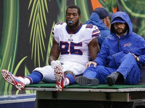 Buffalo Bills tight end Charles Clay (85) is carted off the field in the first half of an NFL football game against the Cincinnati Bengals, Sunday, Oct. 8, 2017, in Cincinnati. (AP Photo/Gary Landers)