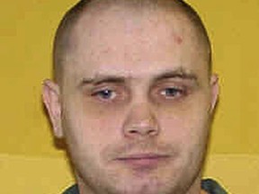 FILE – This undated file photo provided by the Ohio Department of Rehabilitation and Correction shows Joseph Thomas of Perry Township in Lake County, Ohio.  Thomas is accused of raping and fatally stabbing Annie McSween, a bartender in Mentor-on-the-Lake, Ohio, whose body was found Nov. 26, 2010. A divided Ohio Supreme Court overturned Thomas' conviction and death sentence Wednesday, Oct. 4, 2017, ruling his knife collection should not have been introduced into evidence at trial because the weapons weren't used in McSween's slaying. (Ohio Department of Rehabilitation and Correction via AP)