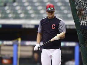 Cleveland Indians' Michael Brantley walks into the batting cage during a team workout, Wednesday, Oct. 4, 2017, in Cleveland. The Indians are scheduled to play the New York Yankees in Game 1 of an ALDS on Thursday. (AP Photo/David Dermer)