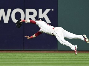 Cleveland Indians' Jason Kipnis catches a fly ball hit by New York Yankees' Chase Headley during the third inning of Game 1 of a baseball American League Division Series, Thursday, Oct. 5, 2017, in Cleveland. (AP Photo/Phil Long)