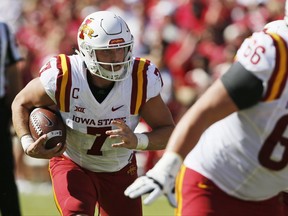 Iowa State quarterback Joel Lanning (7) carries in the first quarter of an NCAA college football game against Oklahoma in Norman, Okla., Saturday, Oct. 7, 2017. (AP Photo/Sue Ogrocki)