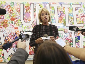 Education secretary Betsy DeVos addresses reporters during her visit to McMinnville High School in McMinnville, Ore., Wednesday, Oct. 11, 2017. (Rockne Roll/News Register via AP)