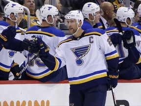 St. Louis Blues' Alex Pietrangelo (27) celebrates his goal as he returns to the bench in the second period of an NHL hockey game against the Pittsburgh Penguins in Pittsburgh, Wednesday, Oct. 4, 2017. (AP Photo/Gene J. Puskar)
