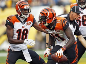 Cincinnati Bengals wide receiver Brandon LaFell (11) celebrates with A.J. Green (18) after scoring during the first half of an NFL football game against the Pittsburgh Steelers in Pittsburgh, Sunday, Oct. 22, 2017. (AP Photo/Keith Srakocic)