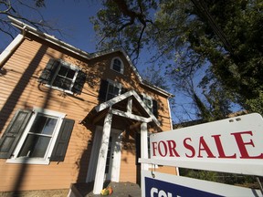 This Tuesday, Oct. 17, 2017, photo shows a home for sale in Fort Washington, Pa. On Thursday, Oct. 19, 2017, Freddie Mac reports on the week's average U.S. mortgage rates. (AP Photo/Matt Rourke)