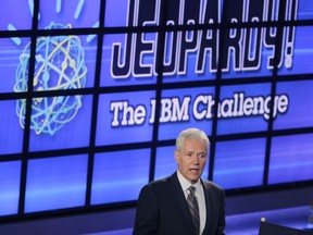 FILE - In this Jan. 13, 2011, file photo, Alex Trebek, host of the "Jeopardy!" quiz show, speaks to an audience of primarily media about an upcoming "Jeopardy!" show featuring IBM's "Watson" in Yorktown Heights, N.Y. New York City bartender Austin Rogers extended his run of wins to eight on the show that aired Oct. 5, 2017, and boosted his total winnings to more than $300,000. Rogers' on-screen antics are winning him a cult following. (AP Photo/Seth Wenig, File)