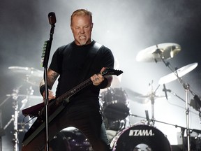 FILE - In this July 29, 2017, file photo, James Hetfield of Metallica performs during the band's concert at The Rose Bowl in Pasadena, Calif. Metallica and Dave Matthews are headlining a wildfire relief concert on Nov. 9, 2017, in San Francisco. (Photo by Chris Pizzello/Invision/AP, File)