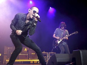 FILE - In this May 16, 2015, file photo, Chester Bennington performs in concert during the MMRBQ Music Festival 2015 at the Susquehanna Bank Center in Camden, N.J. Bennington's band Linkin Park released an episode of "Carpool Karaoke" on Oct. 12, 2017, that was taped in July, six days before Bennington took his own life on July 20. (Photo by Owen Sweeney/Invision/AP, File)