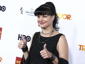 FILE - In this Dec. 6, 2015, file photo, Pauley Perrette attends 2015 TrevorLIVE LA held at the Hollywood Palladium in Los Angeles. Perrette confirmed reports of her departure from the program on Oct. 4, 2017, saying she'll be leaving the show after its current season. (Photo by John Salangsang/Invision/AP, File)