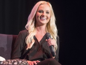 FILE - In this Aug. 29, 2017, file photo, conservative commentator Tomi Lahren attends Politicon in Pasadena, Calif. Fox News Channel has hired Lahren, who has hosted shows on The Blaze and One America News Network along with working for a political action committee supporting President Donald Trump. Lahren received a backlash after posting a picture of a U.S. flag-themed Halloween costume on Oct. 29, 2017.  (Photo by Colin Young-Wolff/Invision/AP, File)