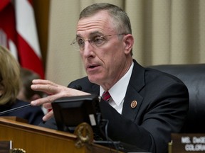 FILE – In this April 1, 2014, file photo, U.S. Rep. Tim Murphy, R-Pa., chairman of the House Energy and Commerce subcommittee on Oversight and Investigations, questions General Motors CEO Mary Barra about safety defects and the recall of 2.6 million cars with faulty ignition switches, during a hearing on Capitol Hill in Washington. On Tuesday, Oct. 3, 2017, the Pittsburgh Post-Gazette reported the newspaper obtained text messages suggesting Murphy asked a woman with whom he was having an extramarital affair, Shannon Edwards, to have an abortion when he thought she might be pregnant. Edwards, it turned out, wasn't pregnant. (AP Photo/J. Scott Applewhite, File)