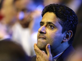FILE - In this Aug.25, 2016 file photo, President of Paris Saint-Germain soccer club, Nasser Al-Khelaifi, gestures during the UEFA Champions League draw at the Grimaldi Forum, in Monaco. Swiss federal prosecutors have announced Thursday Oct.12, 2017 a criminal case for suspected bribery linked to World Cup broadcast rights against Nasser Al-Khelaifi. (AP Photo/Claude Paris, File)