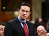 Conservative finance critic Pierre Poilievre accused Bill Morneau of keeping âsecret from the Canadian people over $40 million of investments that he had in a company that he regulated.â
