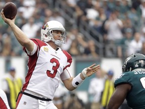 Arizona Cardinals' Carson Palmer passes during the first half of an NFL football game against the Philadelphia Eagles, Sunday, Oct. 8, 2017, in Philadelphia. (AP Photo/Michael Perez)