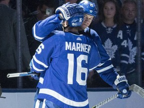 Toronto Maple Leafs forwards Matt Martin and Mitch Marner celebrate a goal against the Los Angeles Kings on Oct. 23.