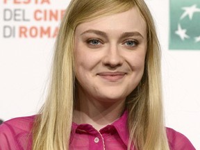 Actress Dakota Fanning poses during the photocall for the movie 'Please Stand By' at the Rome Film Festival, in Rome, Tuesday, Oct. 31, 2017. (Claudio Onorati/ANSA via AP)