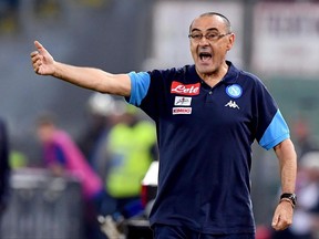 Napoli coach Maurizio Sarri shouts during the Serie A soccer match between Roma and Napoli at the Rome Olympic stadium, Sunday, Oct. 14, 2017. (Ettore Ferrari/ANSA via AP)