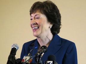 Sen. Susan Collins, R-Maine, smiles during a news conference Friday, Oct. 13, 2017, in Rockland, Maine, after announcing she will remain in the U.S. Senate and not run for governor. (AP Photo/David Sharp)